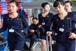 朝鲜空姐新版制服 终于与国际接轨了